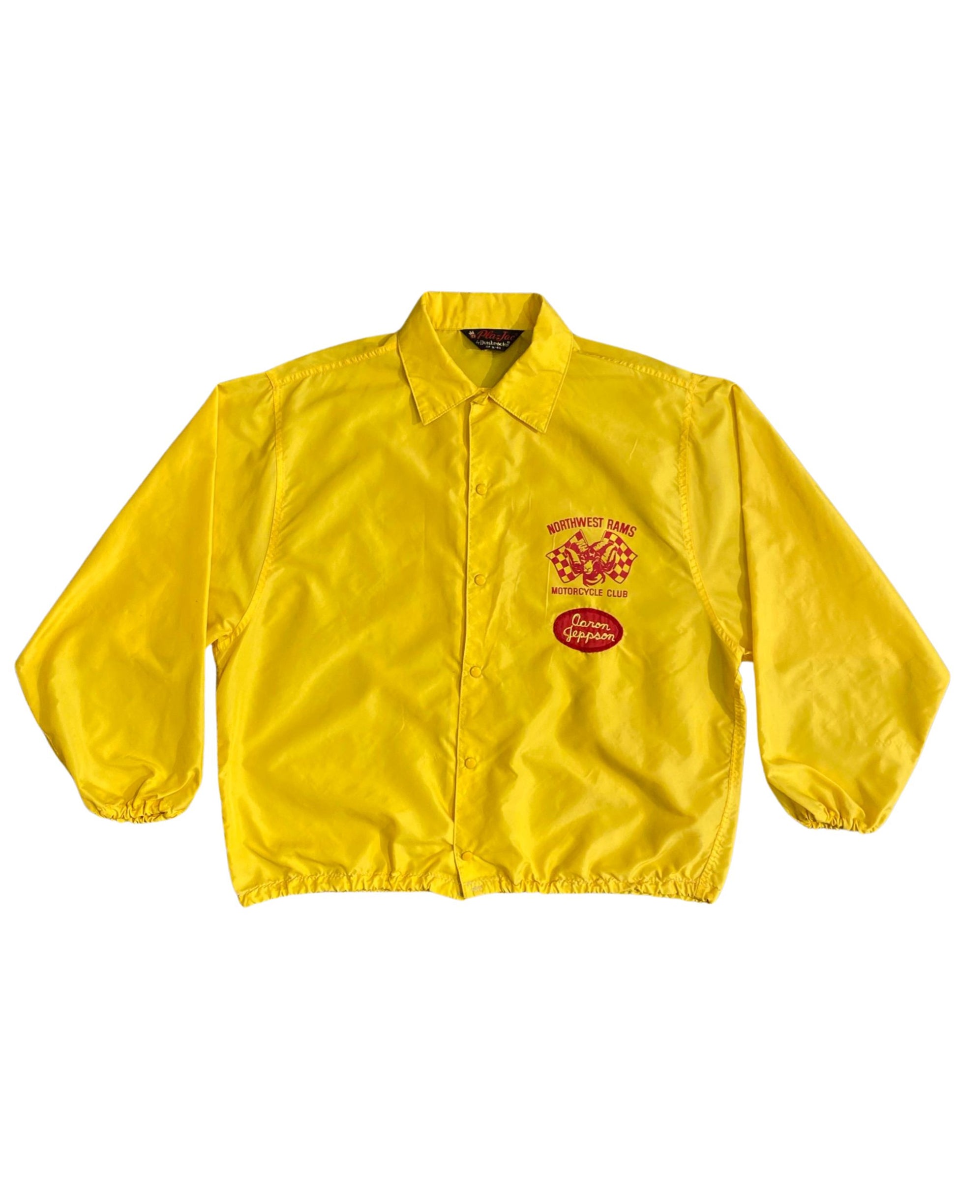 Front view of yellow Northwest Rams Motorcycle Club vintage jacket.
