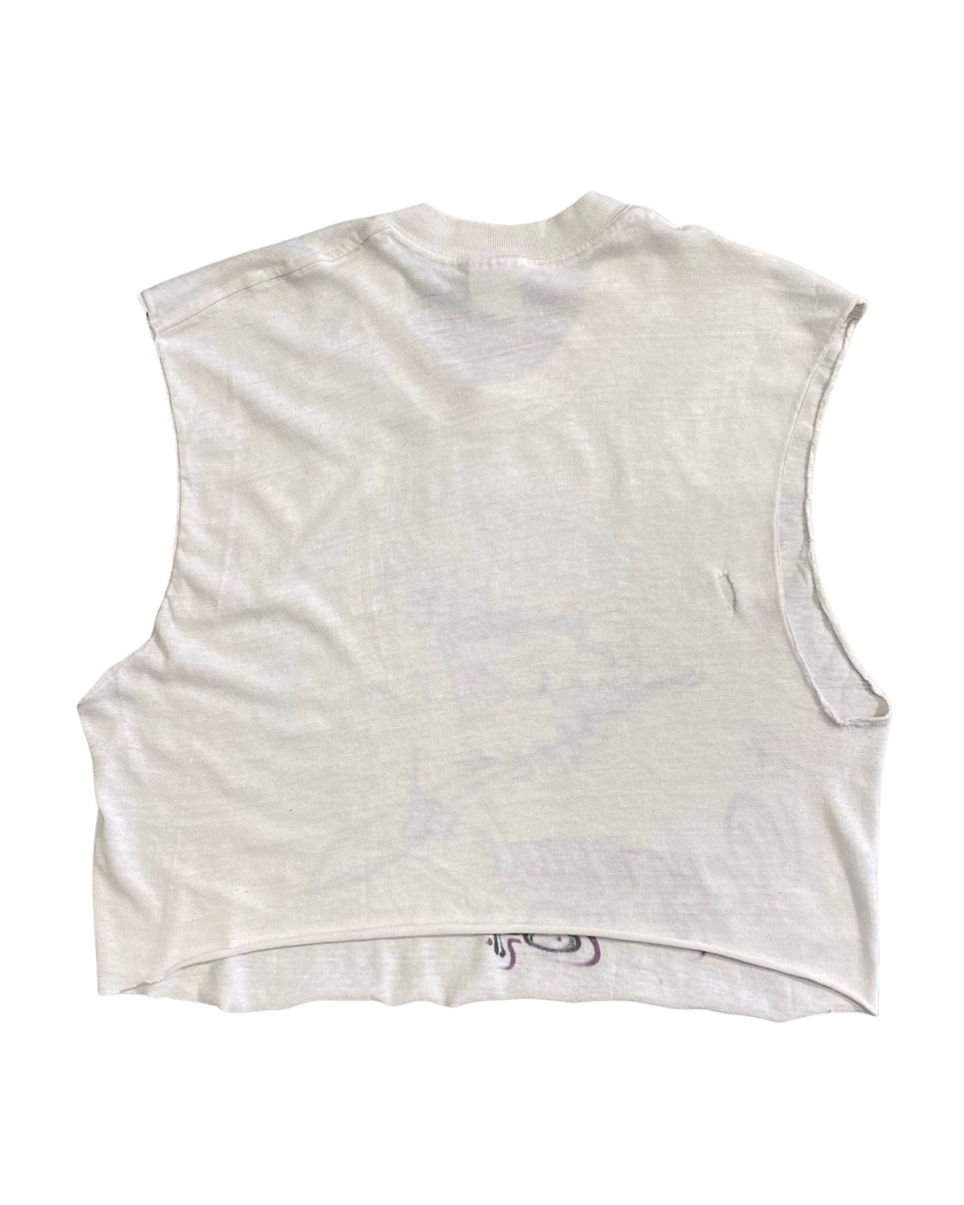  Back view of cut-off vintage 1984 Pangrenade crop T-shirt in off-white.