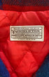 Close-up of Pendleton Woolen Mills label, Made in USA.
