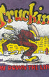 Close-up of the front graphic on a purple tank top with yellow “Truckin’” lettering, a walking cartoon figure, and red “On Down the Line” text.