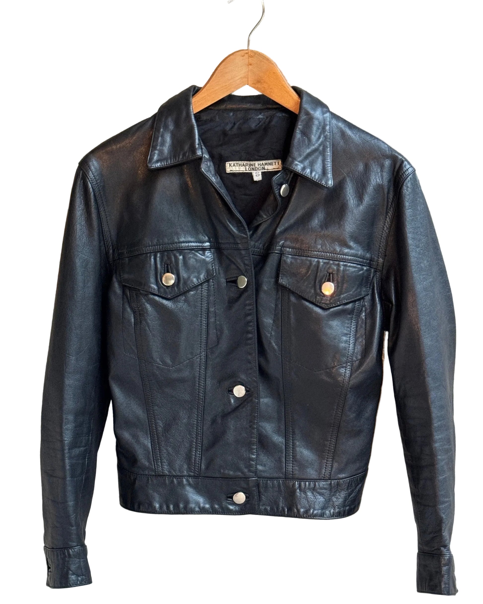 Rare Katherine Hamnett Black Leather Jacket 1980s Vintage England Front on Hanger.