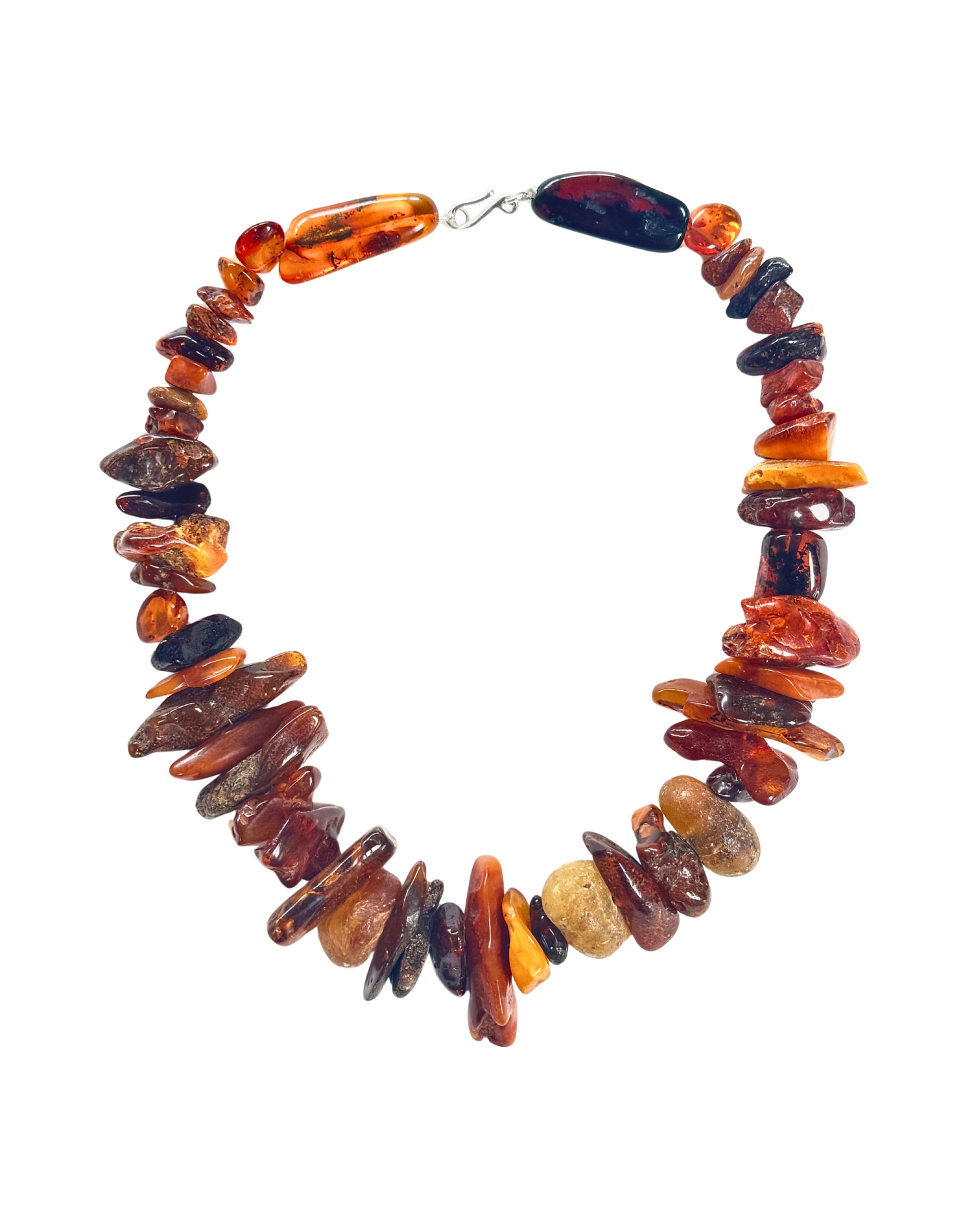 Baltic amber necklace with mixed raw and polished chips.
19-inch multicolor amber necklace with sterling silver clasp.