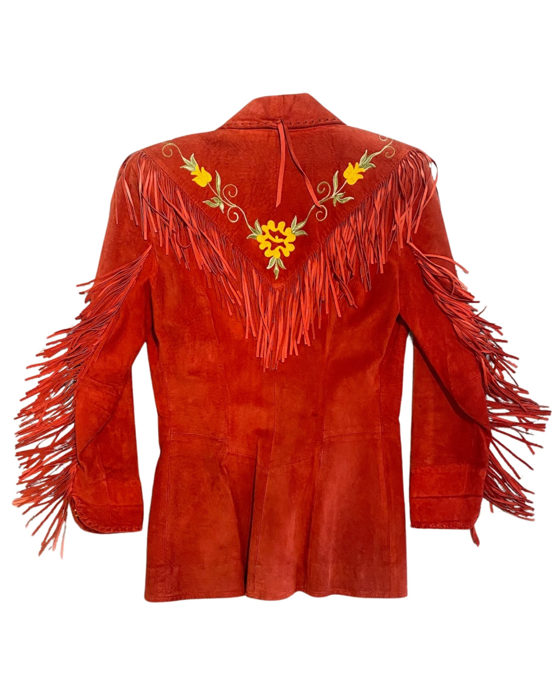 Back view of vintage red suede fringe jacket with embroidered floral yoke and Western styling.
