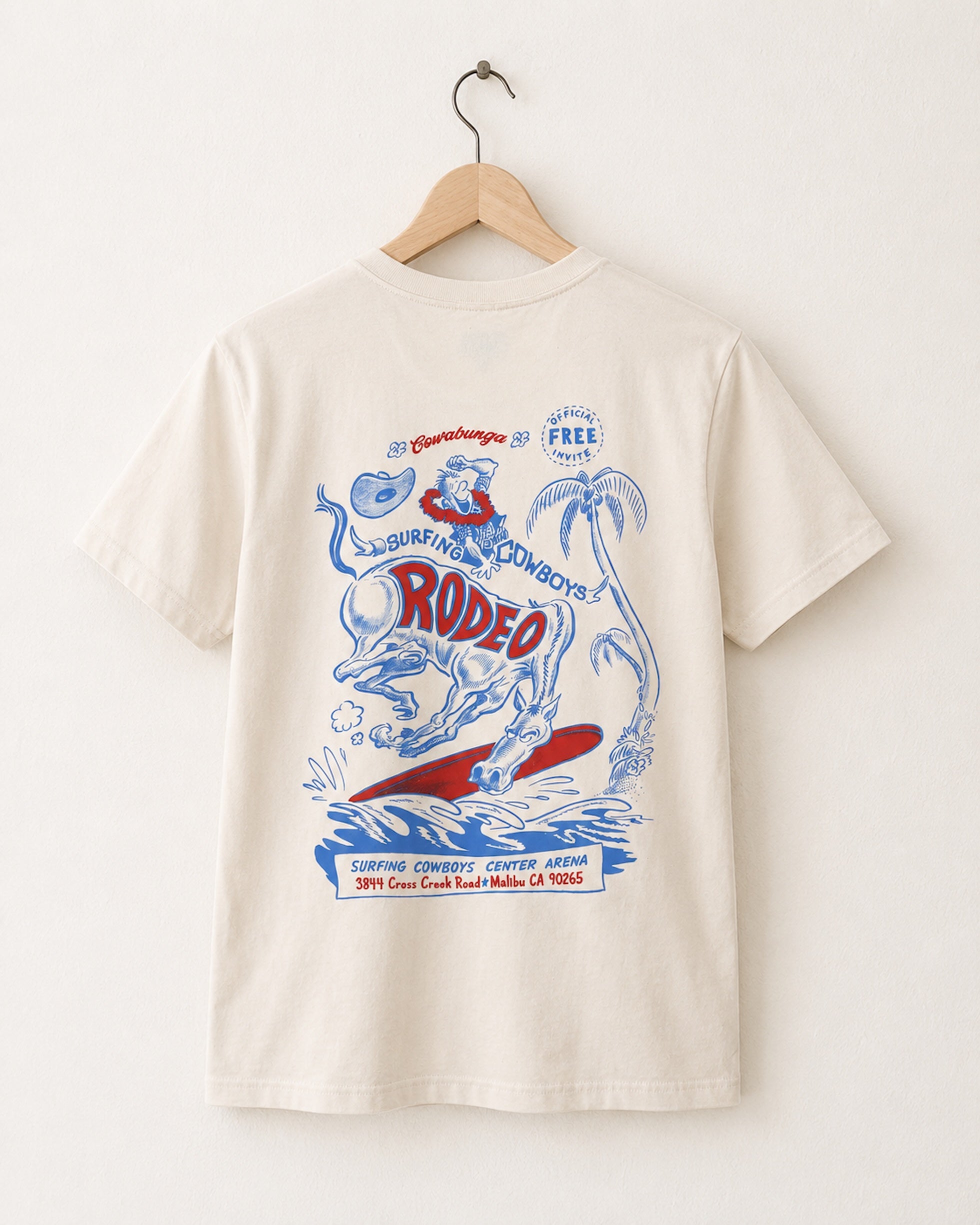 Back view of Surfing Cowboys Rodeo  t-shirt with colorful rodeo graphic design on a hanger against a white background.