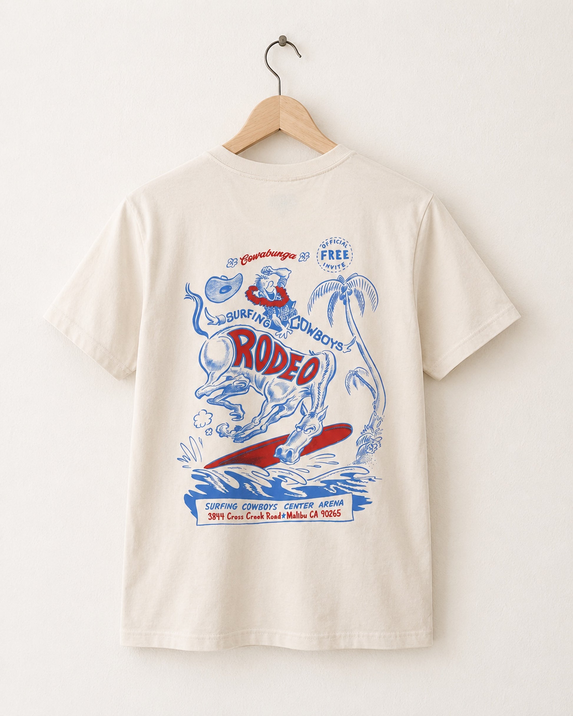Back view of Surfing Cowboys Rodeo  t-shirt with colorful rodeo graphic design on a hanger against a white background.