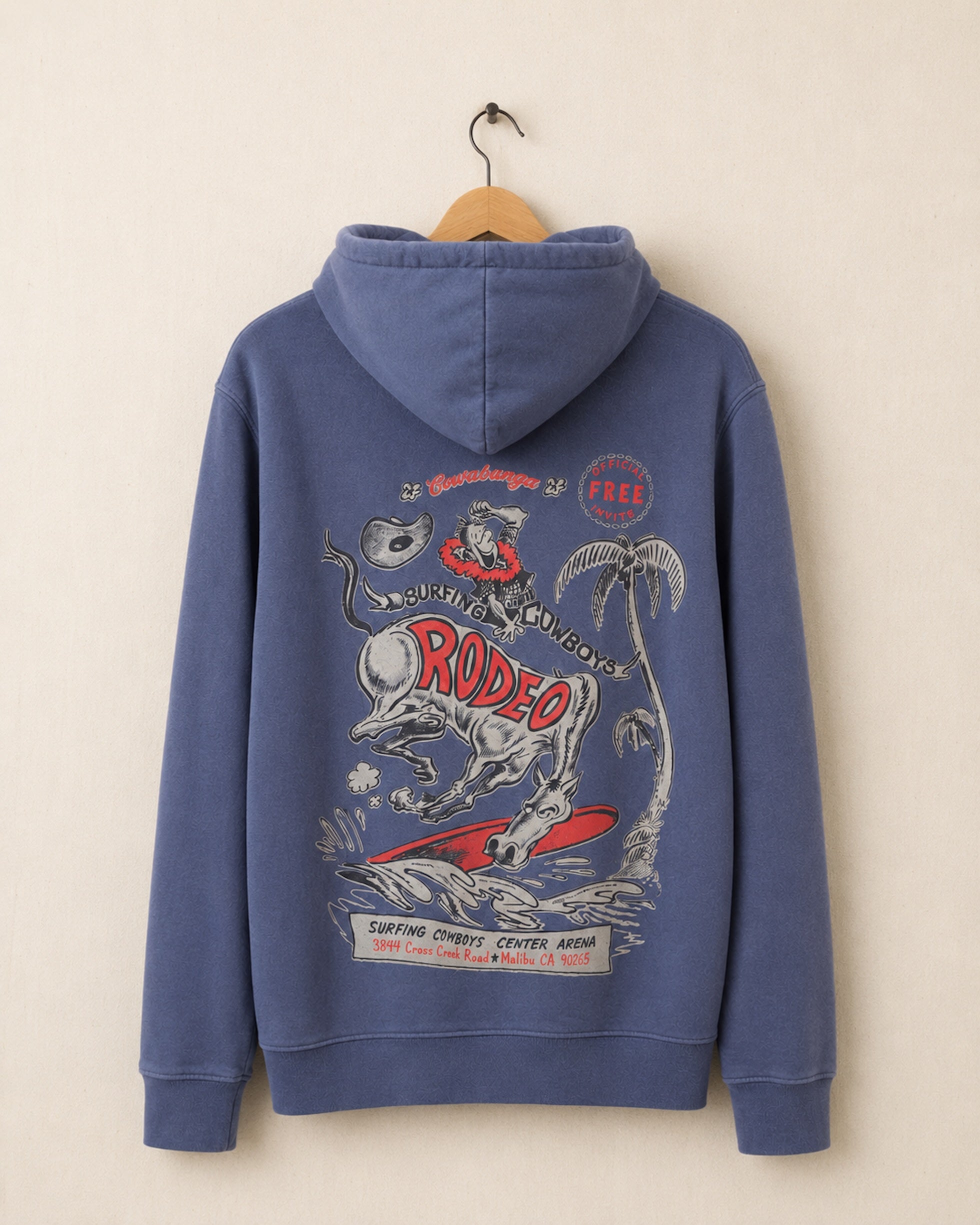 Blue hoodie with a rodeo graphic on a beige background