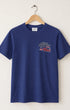 Blue t-shirt with a graphic design on a hanger against a white background