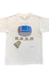 Front view of a white Rush Power Windows tour T-shirt with blue, red, gray, and black geometric graphics and a small control-panel illustration.