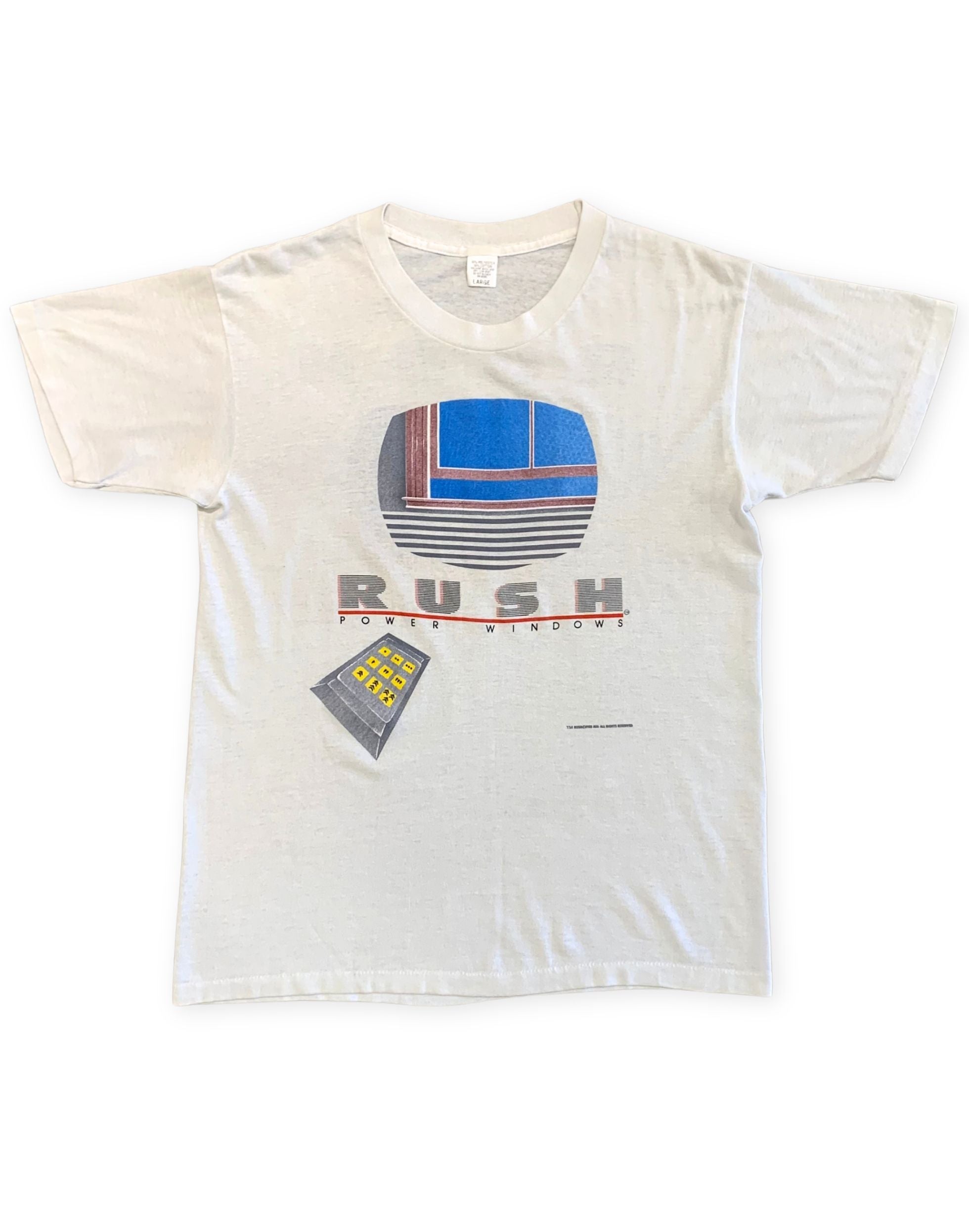 Front view of a white Rush Power Windows tour T-shirt with blue, red, gray, and black geometric graphics and a small control-panel illustration.