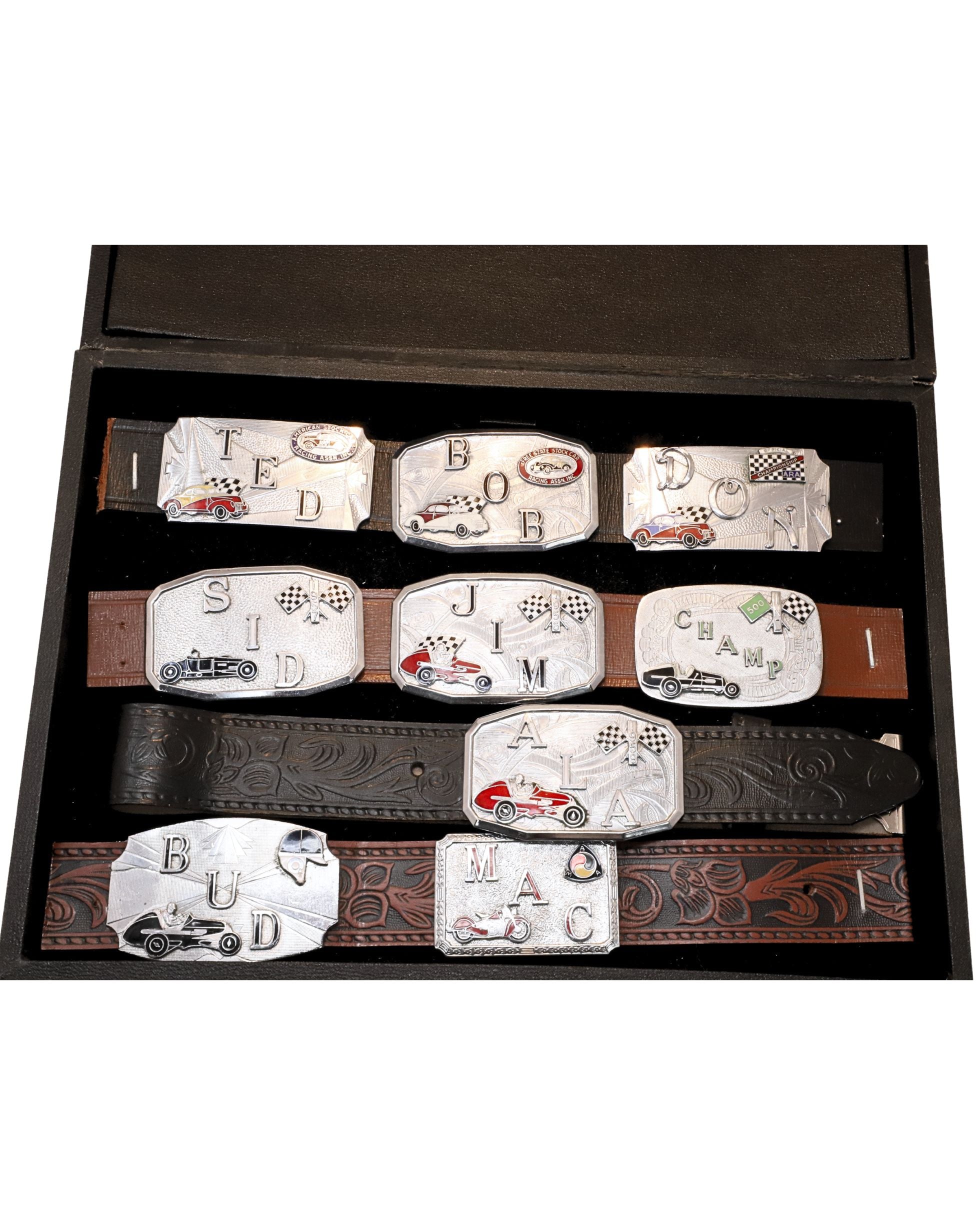 Open display of vintage Hook-Fast belt buckles.