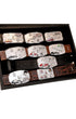 Open display of vintage Hook-Fast belt buckles.