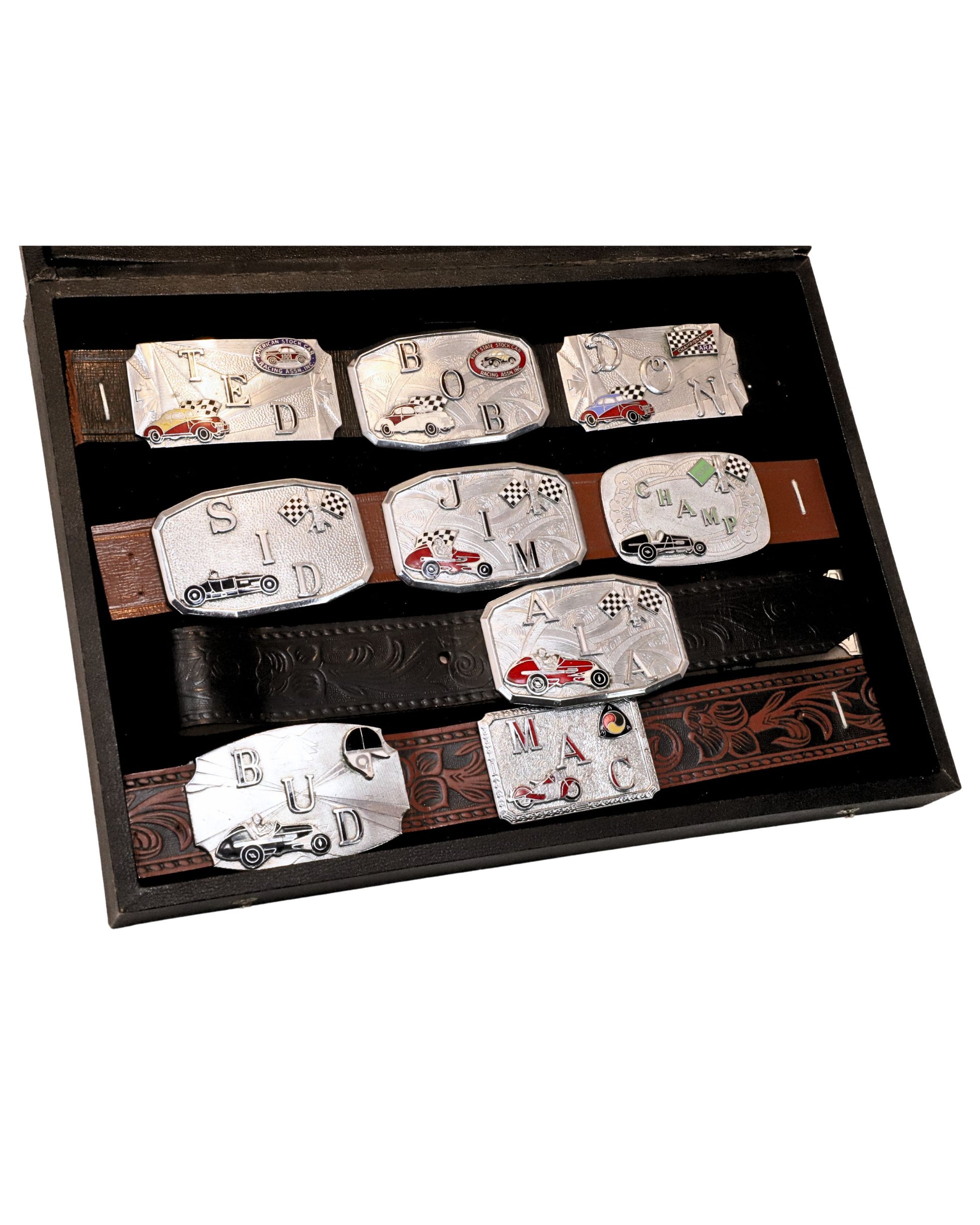 Open display of vintage Hook-Fast belt buckles.