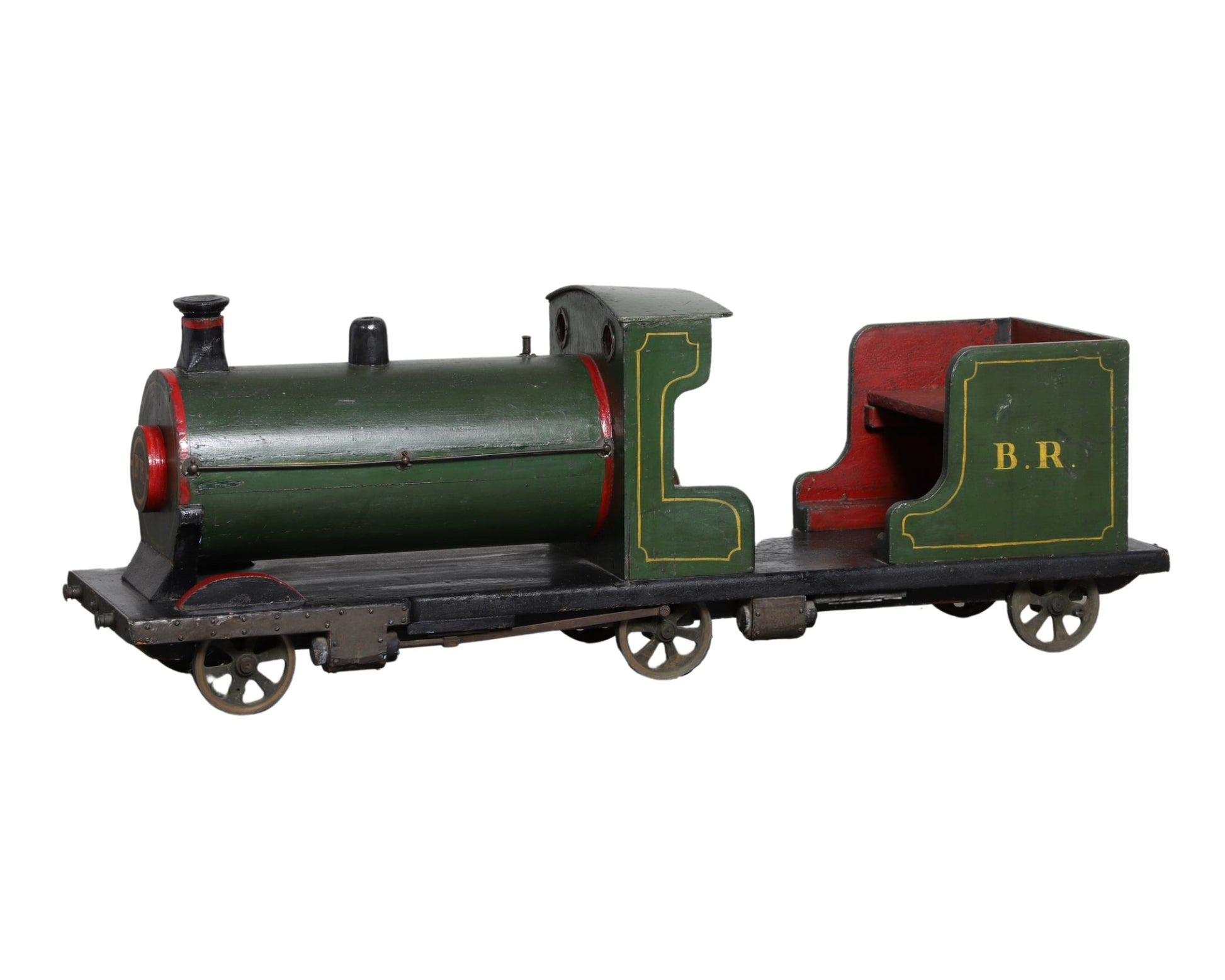 Vintage British Railways scale model locomotive with wood body and metal wheels.