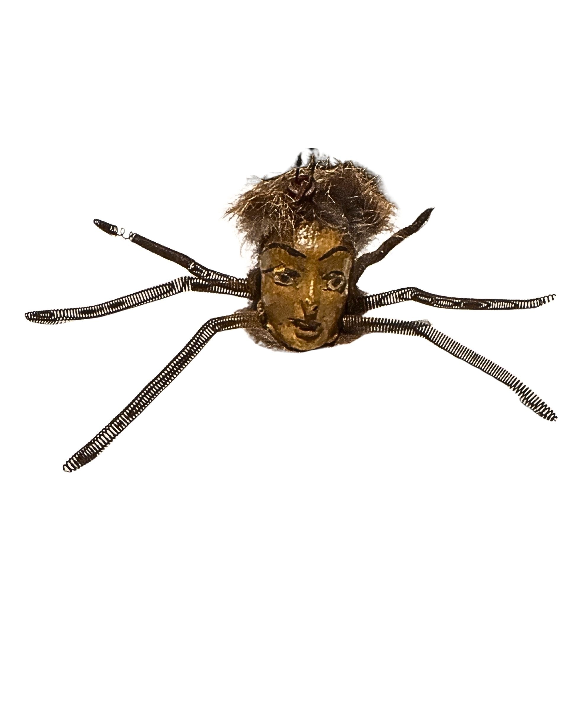 Vintage spider-faced ornament with fur and wire legs, c. 1940s.