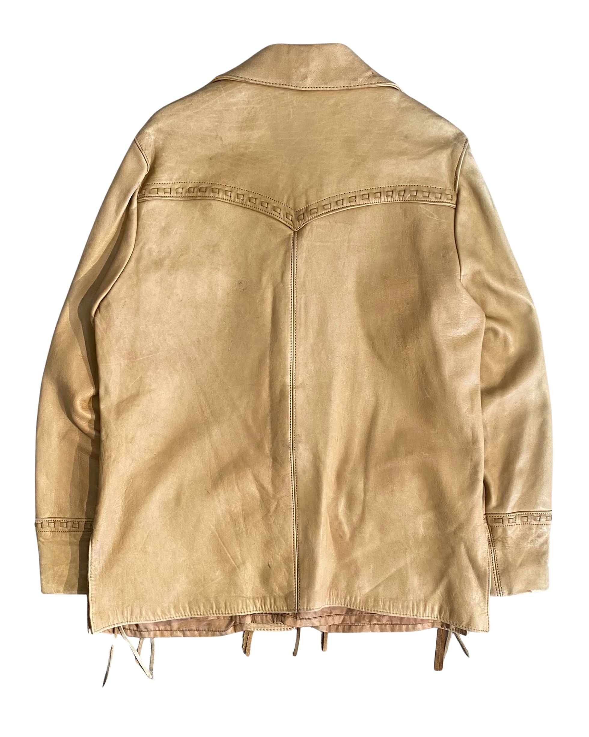 Back view of tan leather Marlboro jacket with Western yoke detailing.