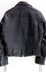 Back of 1950s Taubers black horsehide leather jacket with lace-up sides, Western-inspired yoke, and visible signs of wear.