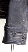 Cuff Detail 1950s Taubers black horsehide leather jacket with lace-up sides, Western-inspired yoke, and visible signs of wear.
