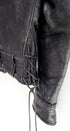 Lace and sleeve detail 1950s Taubers black horsehide leather jacket with lace-up sides, Western-inspired yoke, and visible signs of wear.
