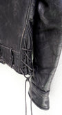 Lace and sleeve detail 1950s Taubers black horsehide leather jacket with lace-up sides, Western-inspired yoke, and visible signs of wear.
