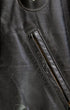 Pocket detail: 1950s Taubers black horsehide leather jacket with lace-up sides, Western-inspired yoke, and visible signs of wear.