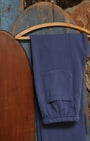 Close-up of pocket and waistband on Surfing Cowboys Weekender Pants in washed navy.