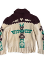 Back view of 1970s handmade wool cardigan featuring bold totem pole motif.
