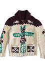 Front view of 1970s beige wool cardigan with green and brown totem pole design.
