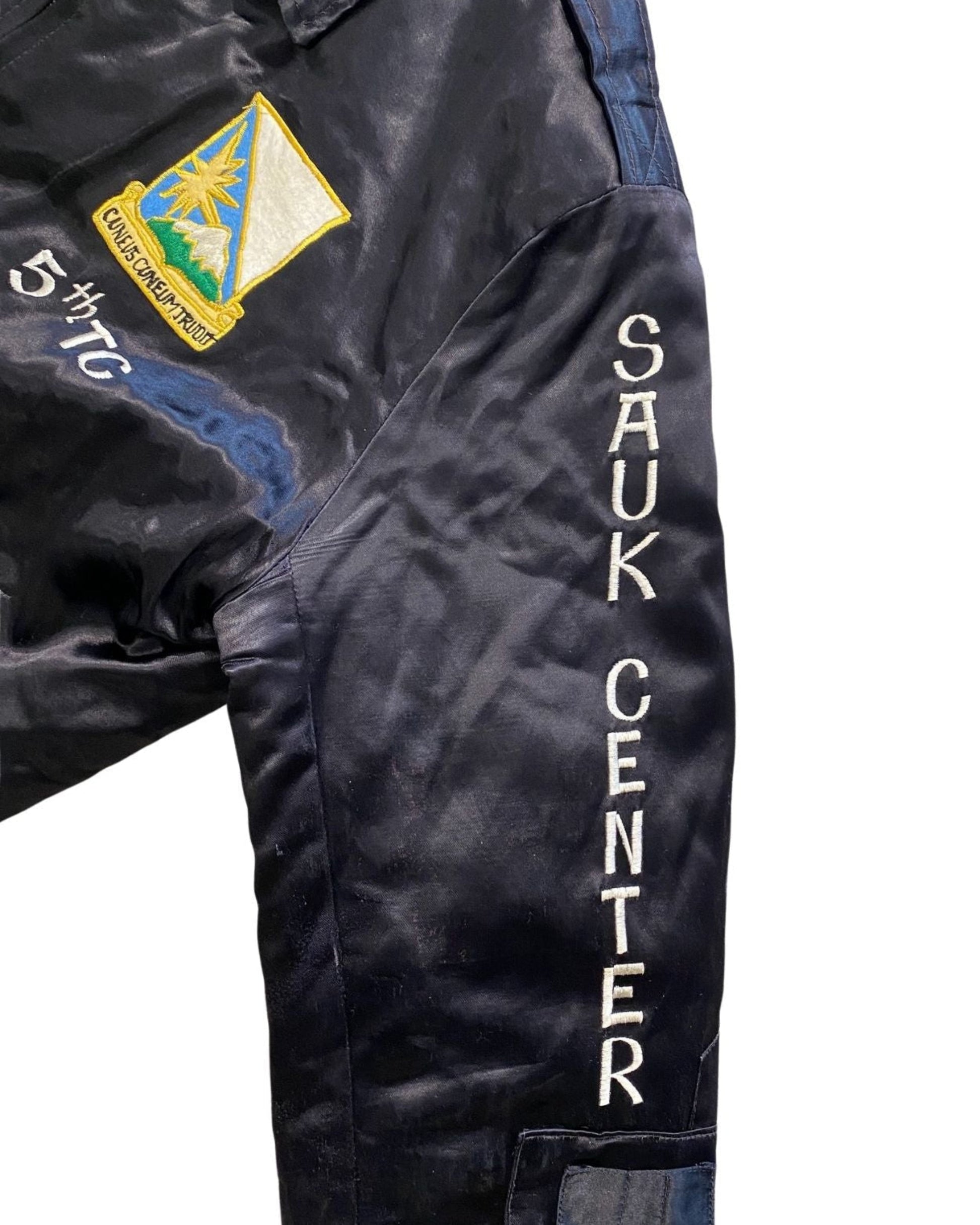 Embroidery of Sauk Center on sleeve of vintage tour jacket.