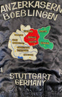 Close-up of Panzerkaserne Boeblingen embroidery with labeled German cities.