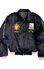 Front of vintage 1962 US Army tour jacket with embroidered insignia and patches.
