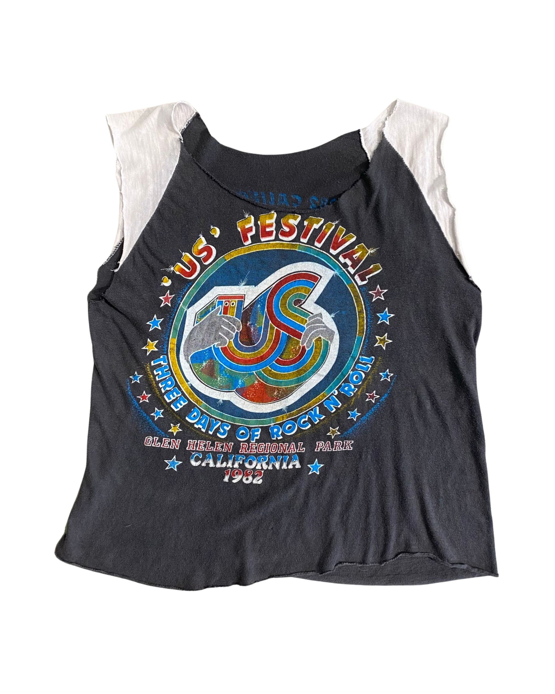 Front view of 1982 US Festival vintage concert T-shirt with bold graphic and cropped sleeves.
