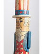 The upclose side view of the Uncle Sam Barbershop Pole Art Sculpture, c. 1960s.