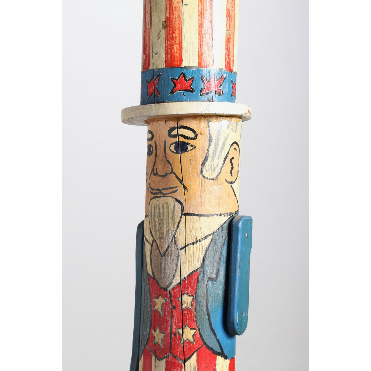 The upclose side view of the Uncle Sam Barbershop Pole Art Sculpture, c. 1960s.