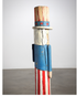 The side view of the Uncle Sam Barbershop Pole Art Sculpture, c. 1960s.
