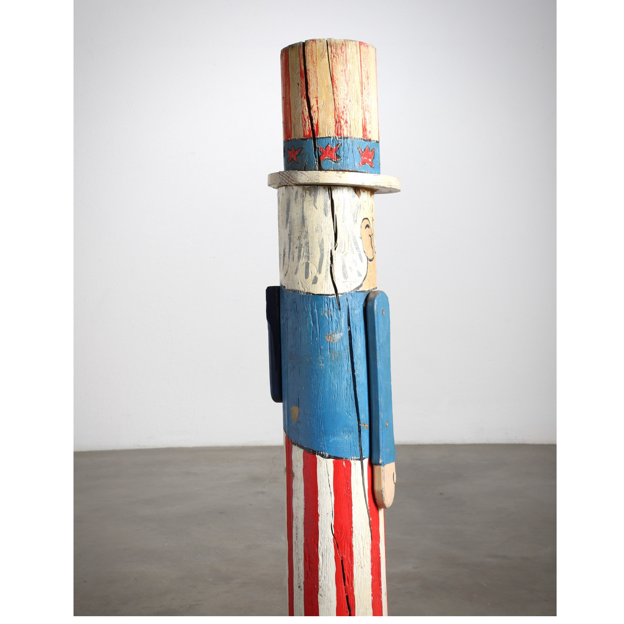 The side view of the Uncle Sam Barbershop Pole Art Sculpture, c. 1960s.