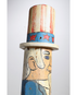 The upclose side view of the Uncle Sam Barbershop Pole Art Sculpture, c. 1960s.