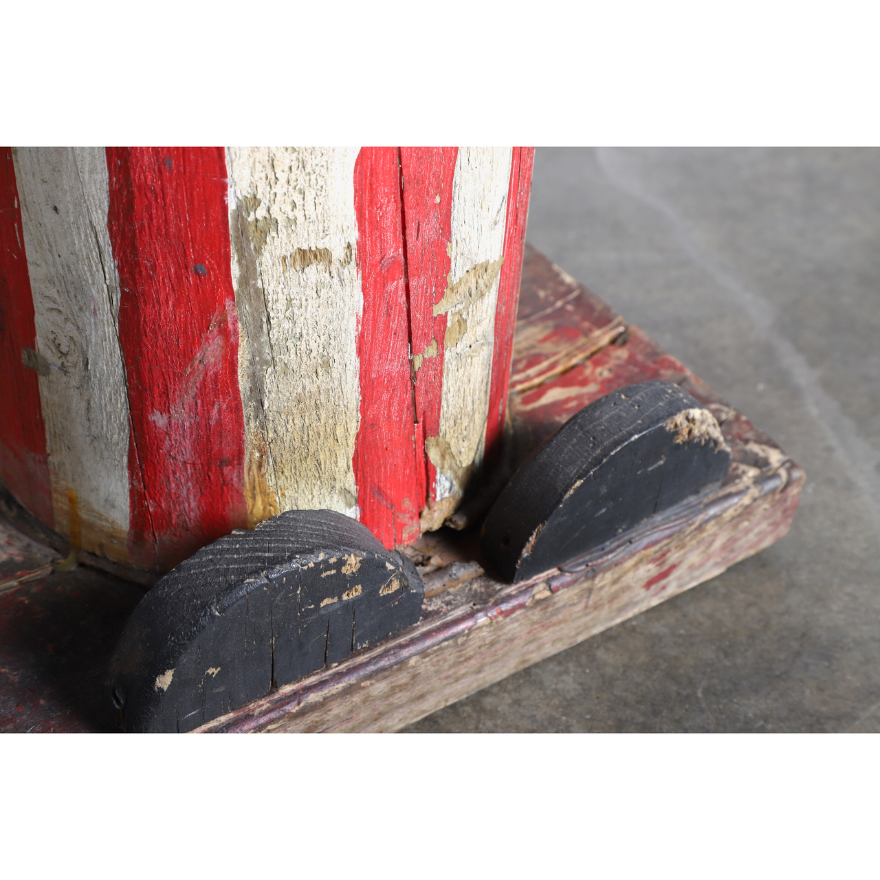 The upclose view of the feet on the Uncle Sam Barbershop Pole Art Sculpture, c. 1960s.