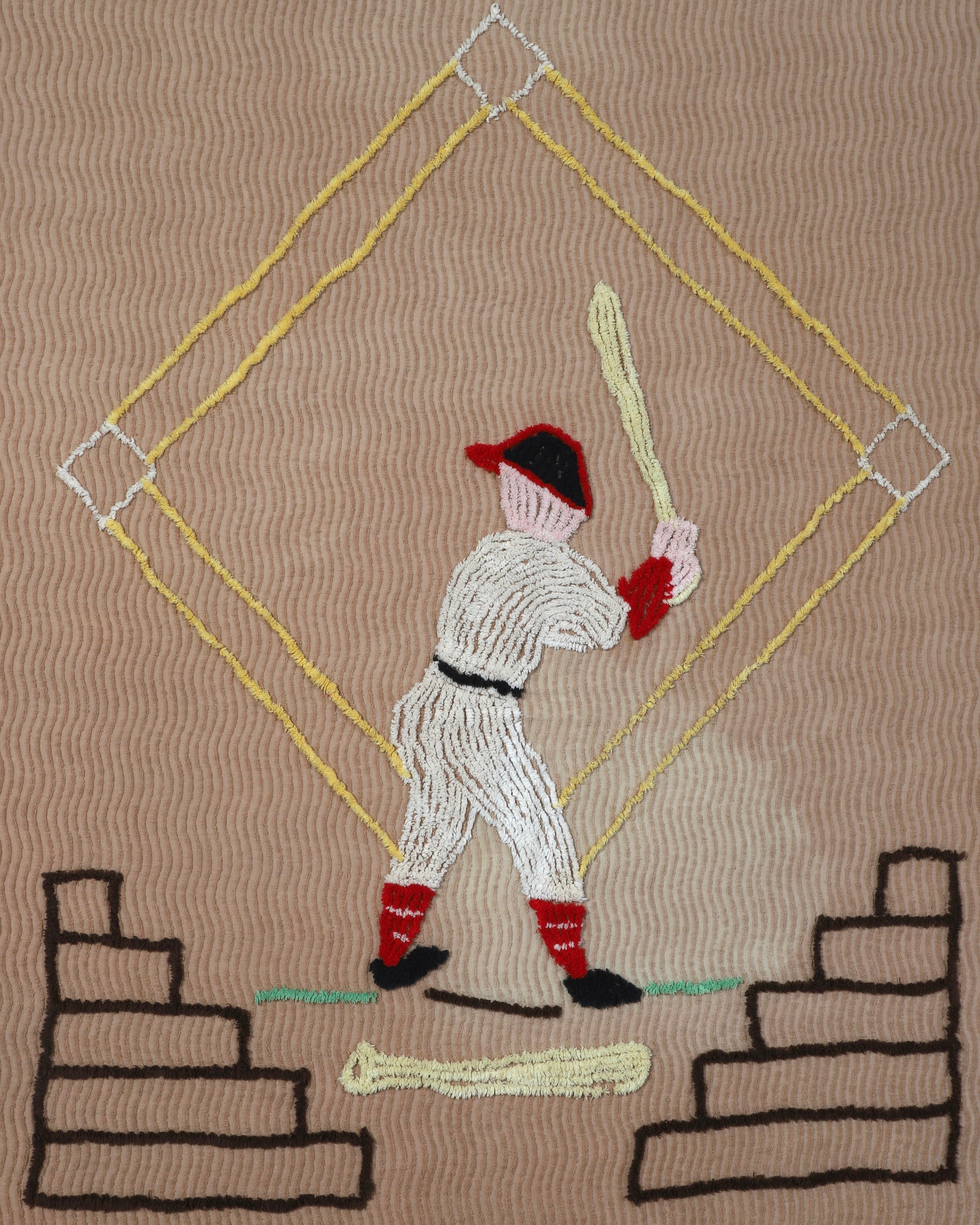  Close-up of vintage 1950s chenille bedspread with baseball motif.