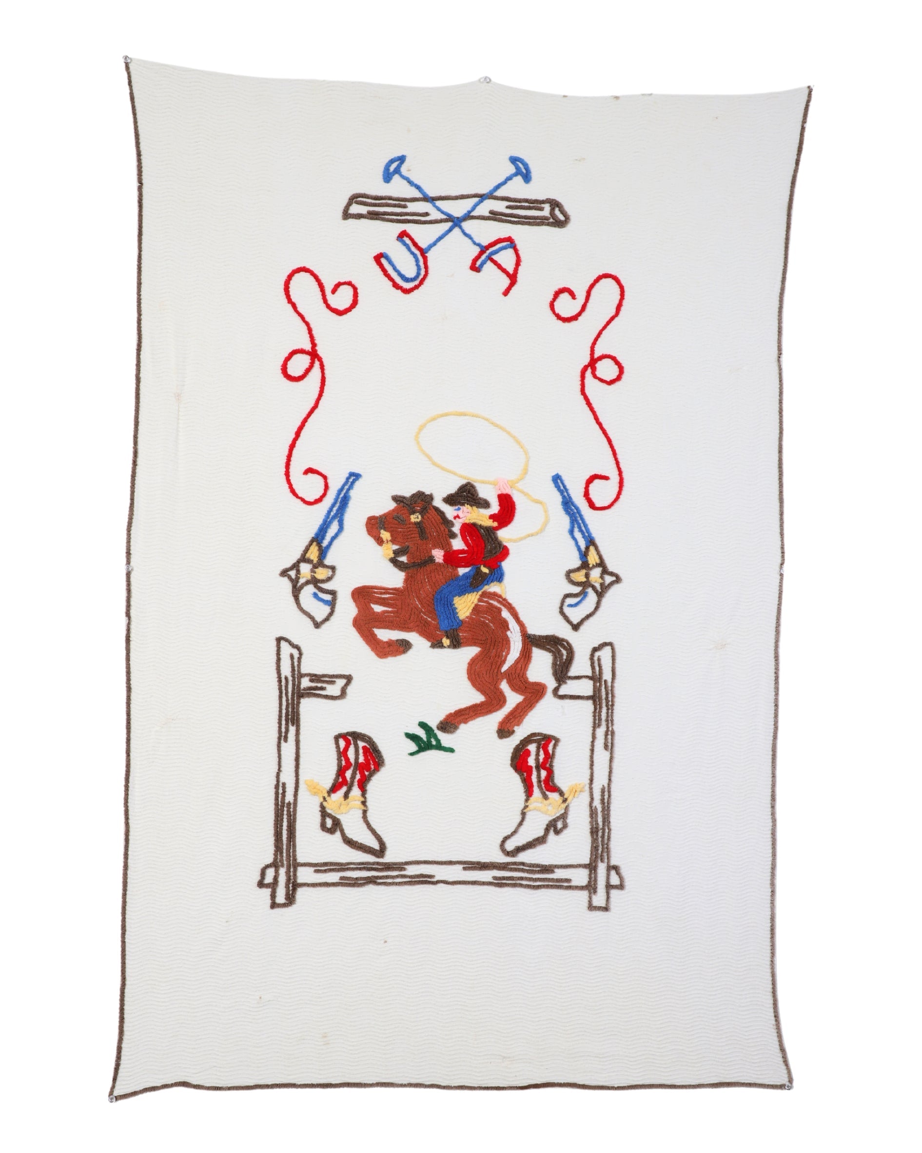 full frontal photo of a vintage bedspread features vibrant and colorful chenille embroidery depicting a lively cowgirl scene, complete with a cowgirl on horseback, crossed rifles, lasso, and cowboy boots. This is a  detailed design and bright primary colors and brown accesnt on a white background. colors 