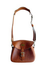 Front view of 1960s Gokey leather cartridge shoulder bag.