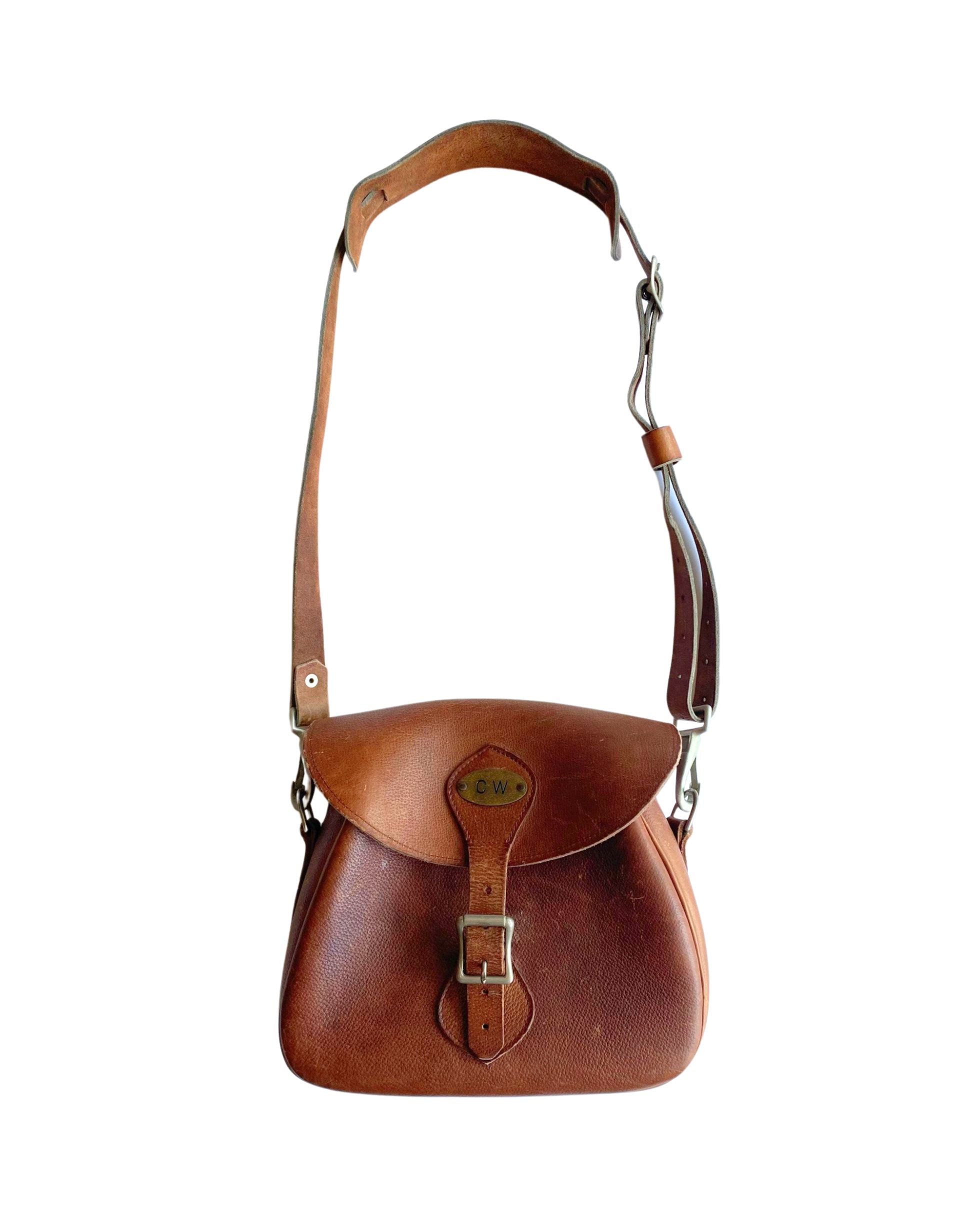 Front view of 1960s Gokey leather cartridge shoulder bag.