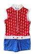1960s vintage kids romper in red, white, and blue terrycloth with zip front and button details. Features figure print top and striped shorts.
