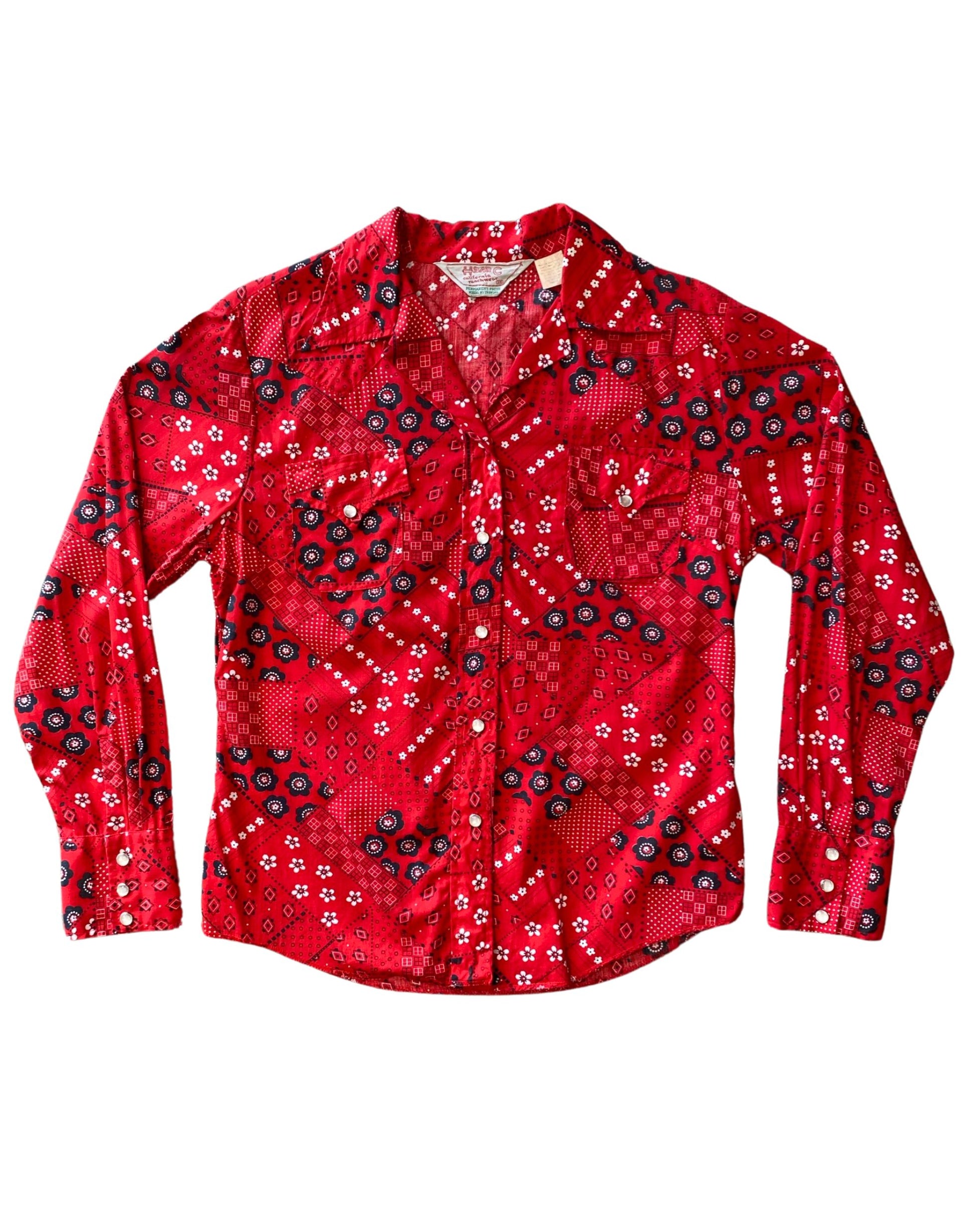  Vintage 1970s red bandana print snap shirt for women, made in USA with Western styling, front view.