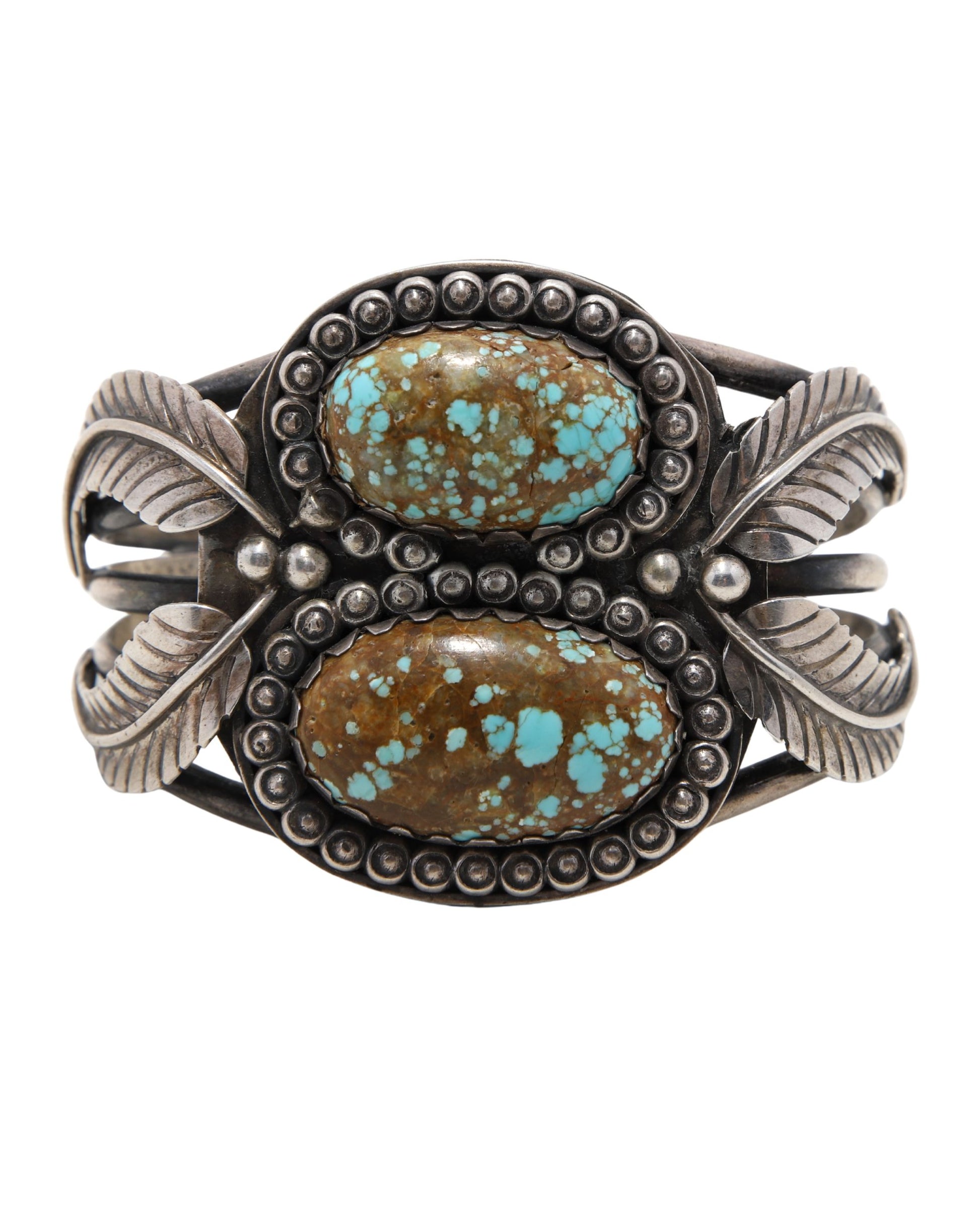 Front view of vintage Navajo cuff with turquoise and sterling silver.