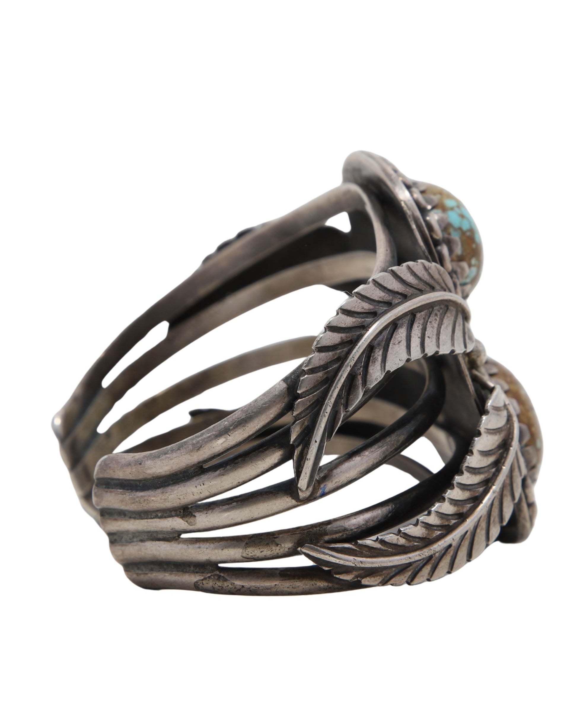 Detail of silver split-shank construction and oxidized patina.