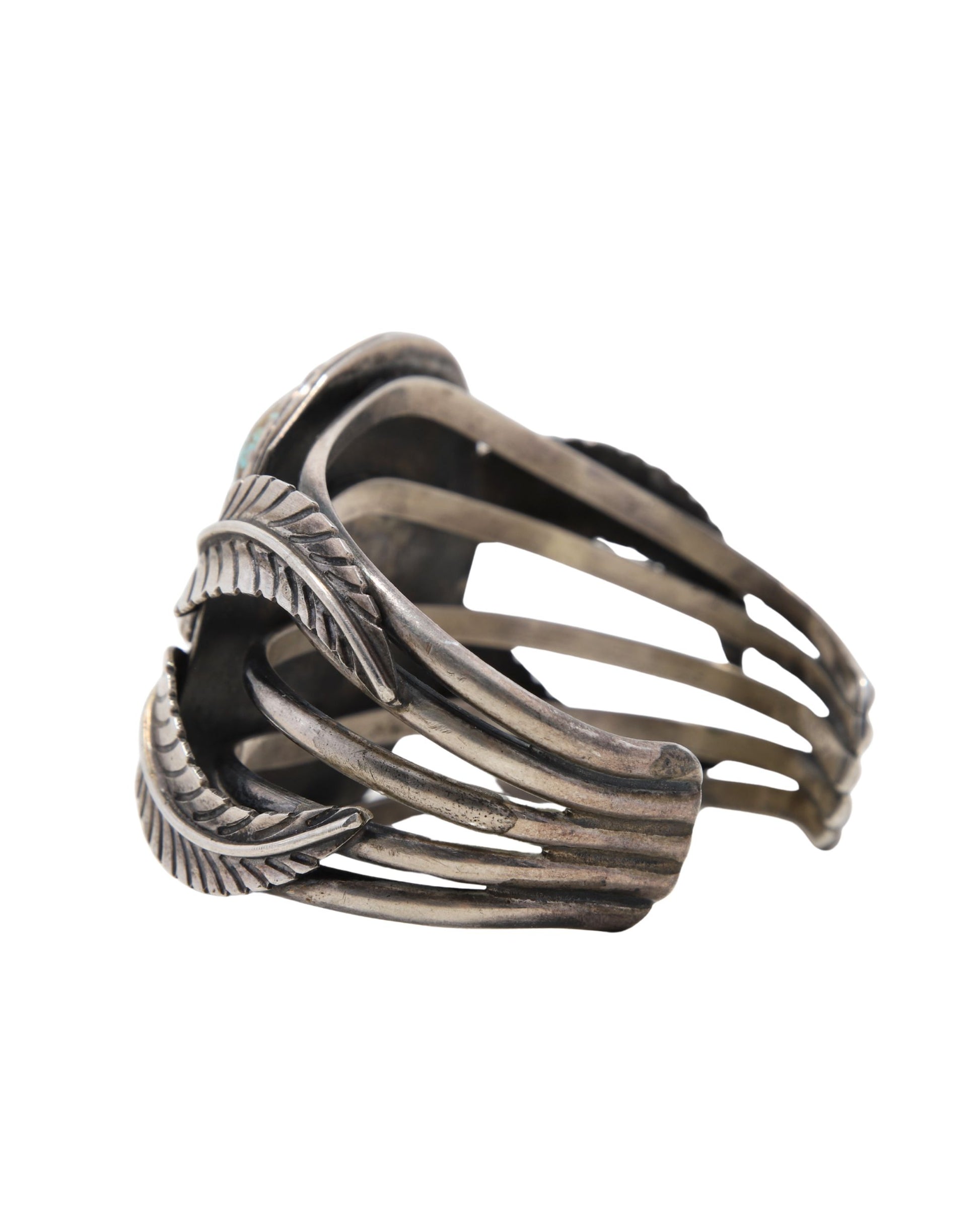 Rear side of bracelet highlighting multi-band design and silver texture.