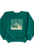 Front view of vintage 1980s 20th Century Fox green raglan crewneck sweatshirt with cream halftone screen print logo graphic, on white background.