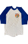 Front view of vintage 1982 Beach Boys North American Tour white and royal blue raglan tee with small chest logo, on white background.