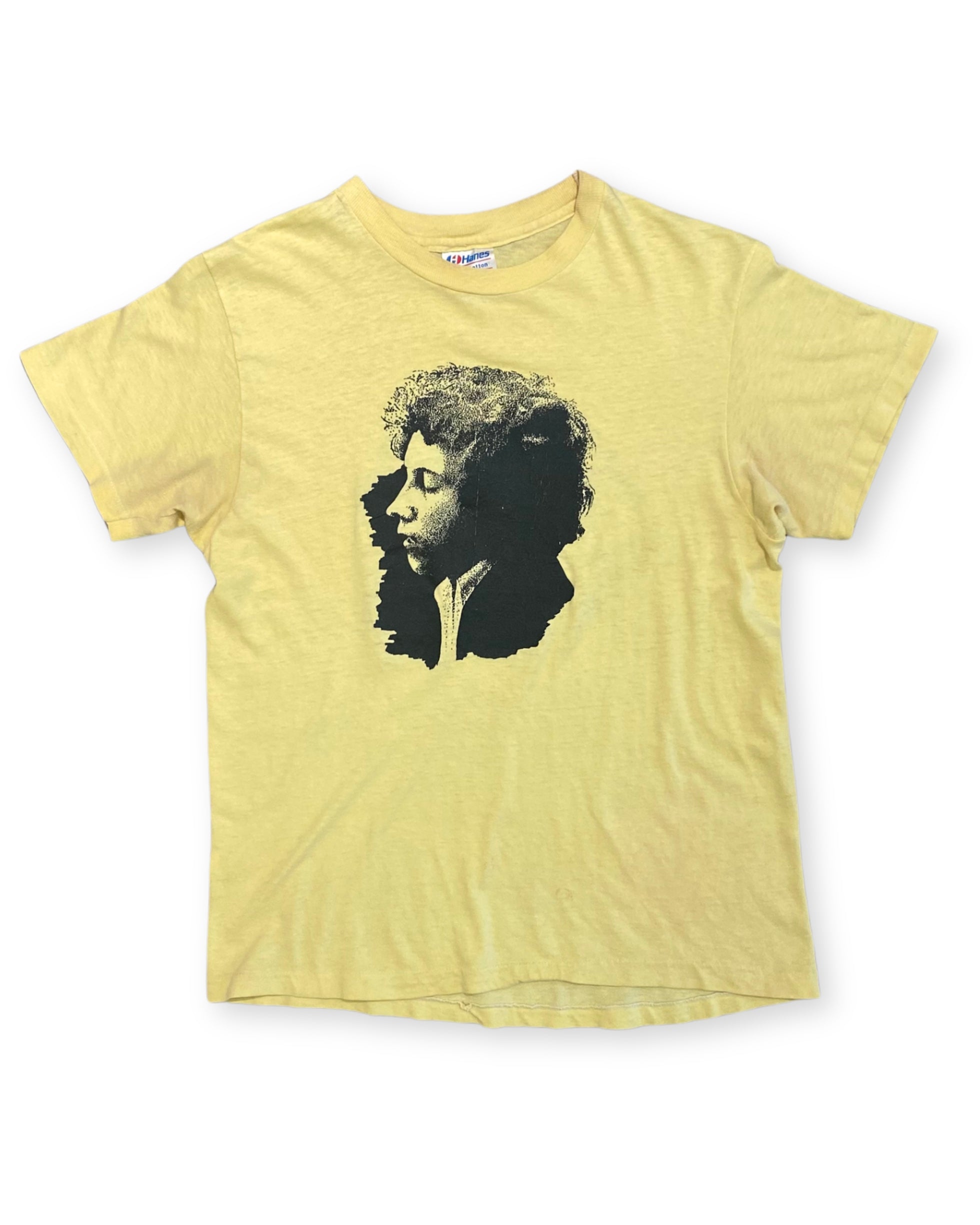 Front view of vintage Arlo Guthrie 1982 Rolling Blunder Revue tour T-shirt with black portrait graphic.
