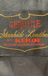 Interior label reading Genuine Steerhide Leather by Kenoe, St. Clair Shores, Michigan.